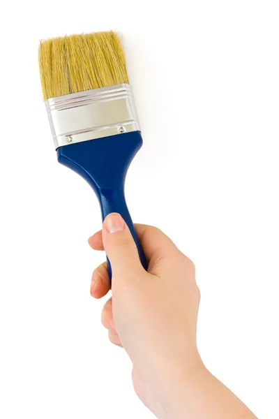 Hand with paintbrush — Stock Photo, Image