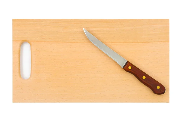 Нож и доска для рубки — стоковое фото
