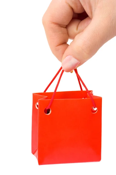 Hand with small bag — Stock Photo, Image