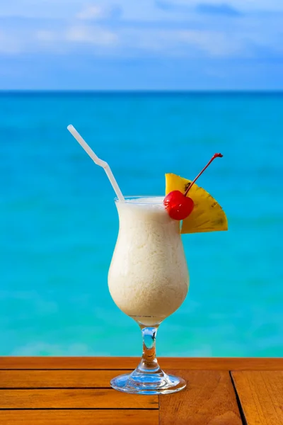 Milk cocktail on table at beach cafe — Stock Photo, Image