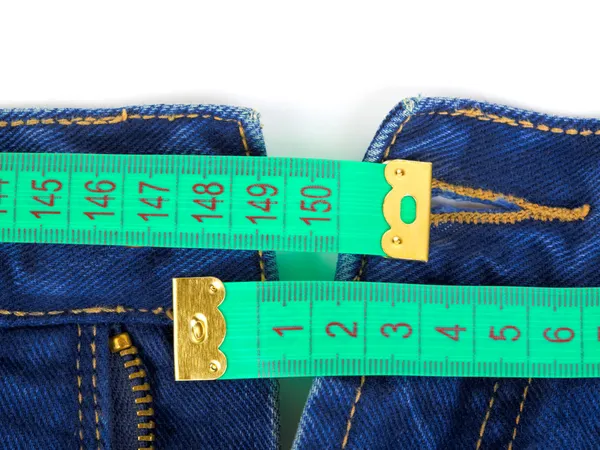 Kot pantolon ve ölçüm bandı — Stok fotoğraf