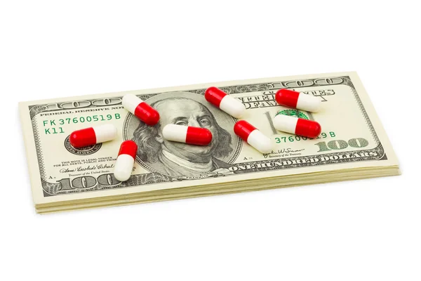 Pills and money — Stock Photo, Image
