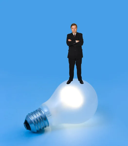Lighting lamp and man — Stock Photo, Image