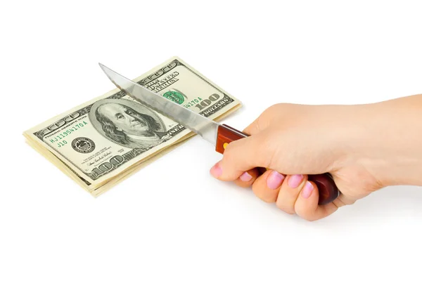 Mão com faca cortando dinheiro — Fotografia de Stock