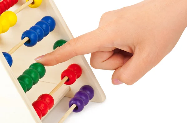 Hand and abacus — Stock Photo, Image