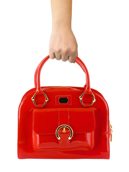 Mujer mano con bolsa roja — Foto de Stock