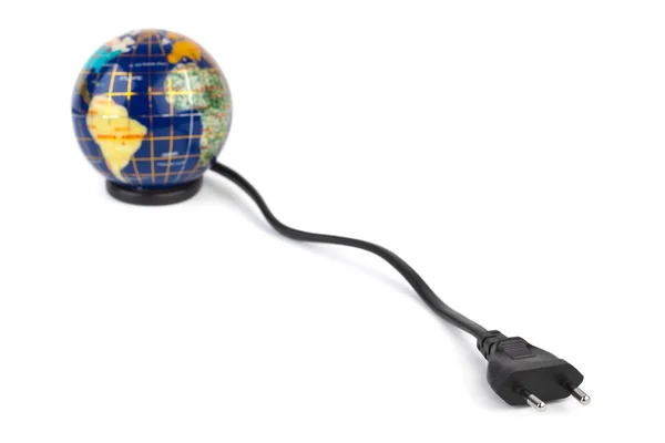Глобус и электрический кабель — стоковое фото