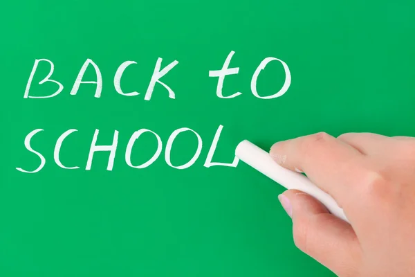 Stock image Hand with chalk writing Back to school