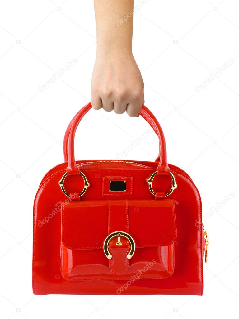 Woman hand with red bag