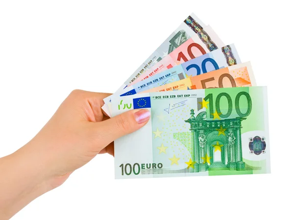 Рука с деньгами евро — стоковое фото