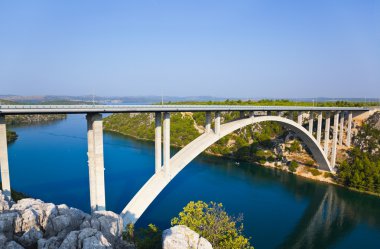 River Krka and bridge in Croatia clipart