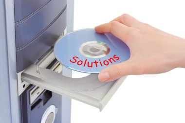 Hand and computer disk solution clipart