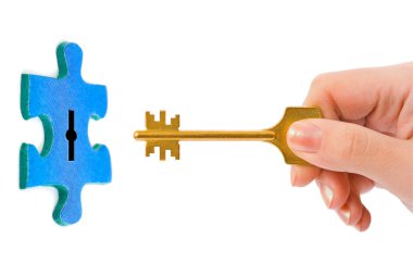 Hand with key and puzzle clipart