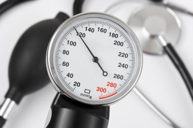 Scale of pressure and stethoscope clipart