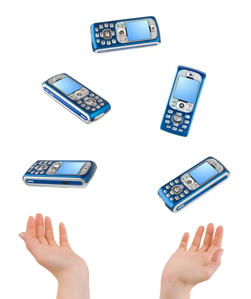Malabarismo mãos e telefones — Fotografia de Stock