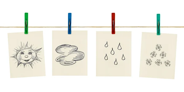 Símbolos meteorológicos en pinzas de ropa —  Fotos de Stock