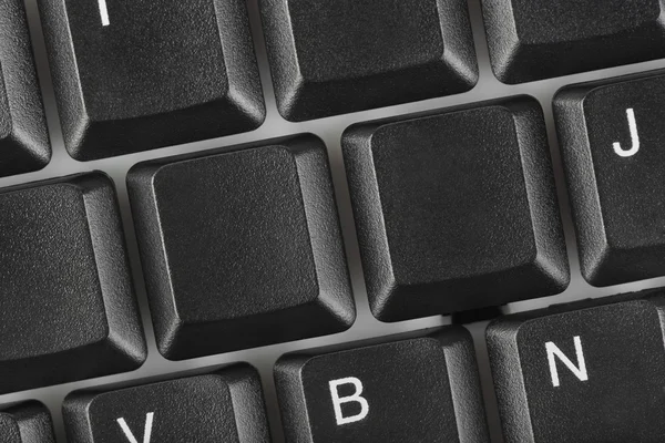 Computer keyboard with two blank keys — Stock Photo, Image