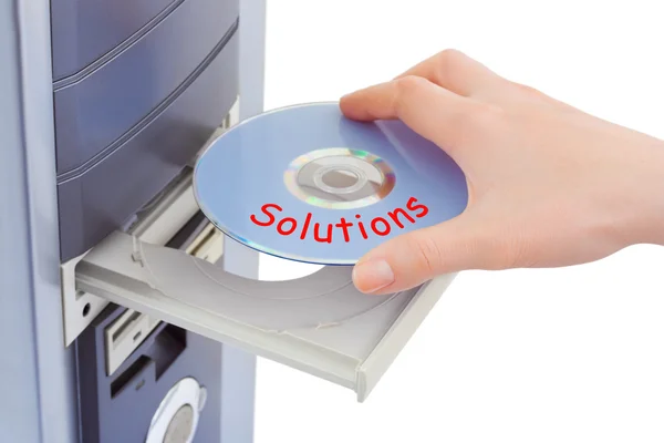 Solução de disco de mão e computador — Fotografia de Stock