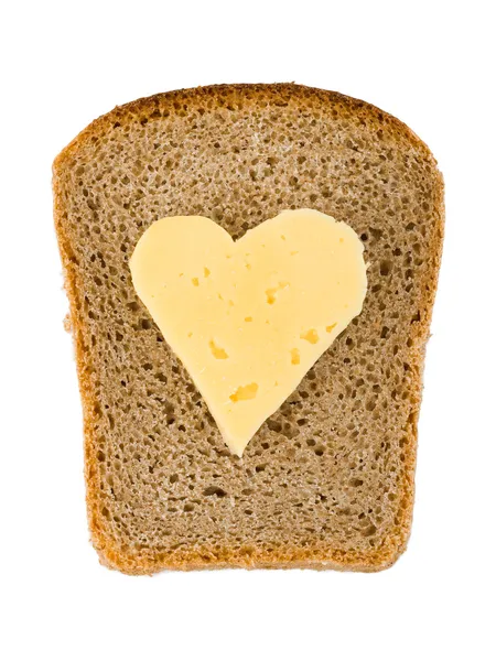 Pão e queijo em forma de coração — Fotografia de Stock