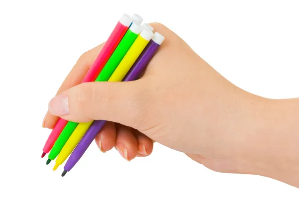 Main avec stylos multicolores — Photo