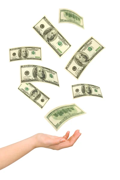 Hand och fallande pengar — Stockfoto