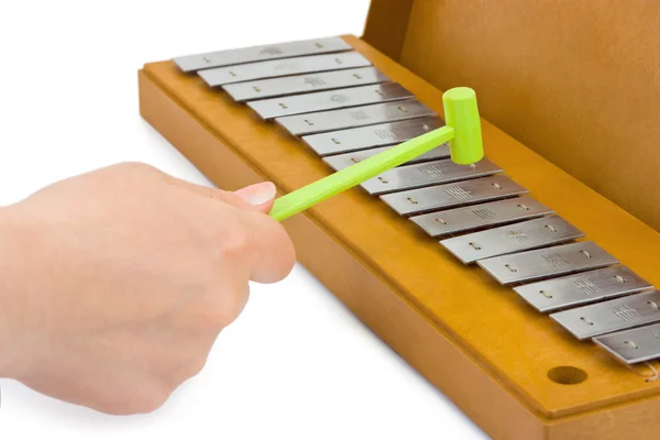 Hand och xylofon — Stockfoto