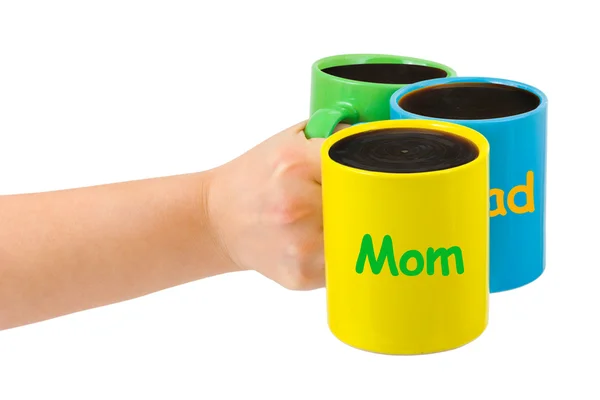 Hand with family cups — Stock Photo, Image