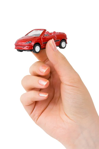 Hand en speelgoed auto — Stockfoto
