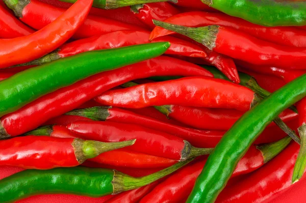 stock image Heap of green and red hot chili pepper