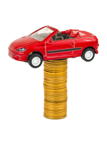 おもちゃの車とのコインのスタック — ストック写真