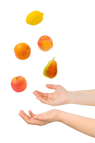 Jonglieren mit Händen und Früchten — Stockfoto