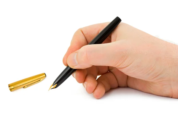 Перьевая ручка в руке Стоковое Фото