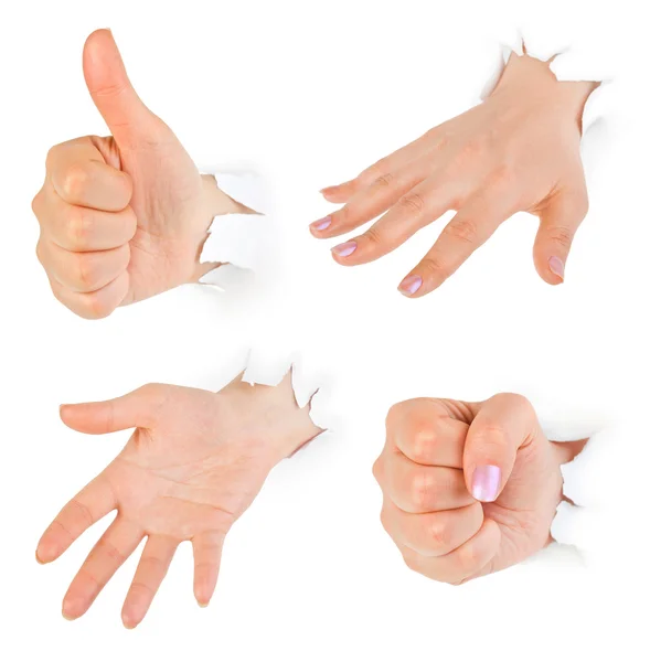 Hands punching through paper — Stock Photo, Image