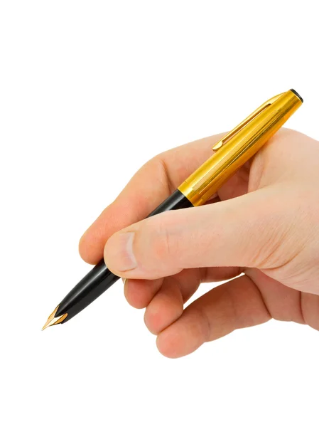 Перьевая ручка в руке — стоковое фото