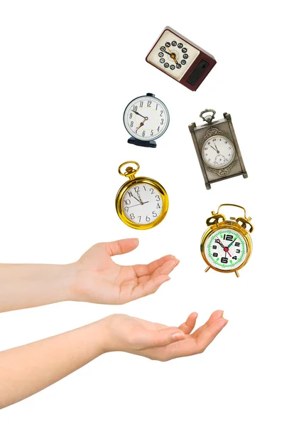 Jongleren handen en klokken — Stockfoto