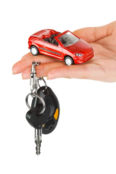 Hand with keys and car — Stock Photo, Image