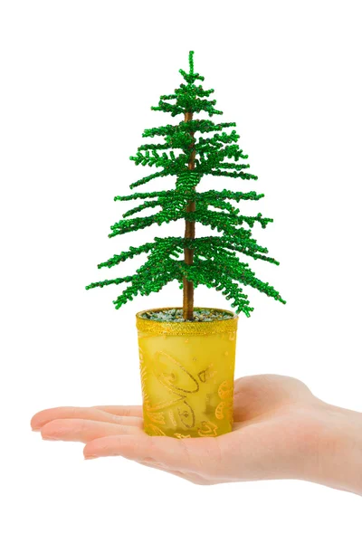 Pomul decorativ de Crăciun în mână — Fotografie, imagine de stoc