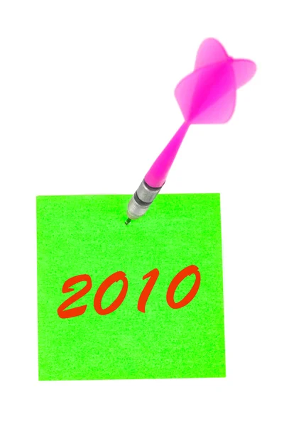 Note paper 2010 and darts arrow — Stock Photo, Image