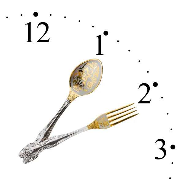 スプーンとフォークの作った時計 — ストック写真