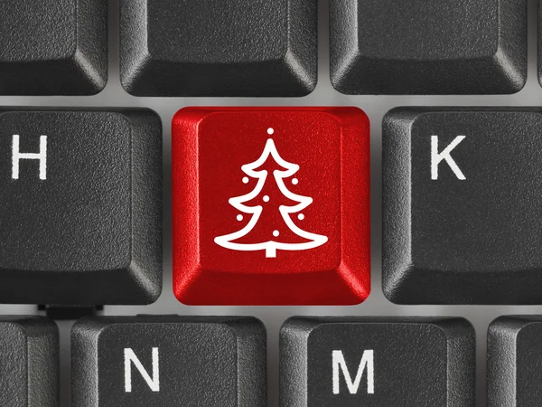 Teclado de computadora con llave de árbol de Navidad —  Fotos de Stock