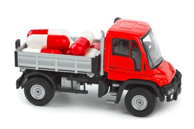 Toy truck with pills clipart