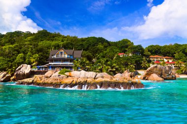 Hotel at tropical beach, La Digue, Seychelles clipart
