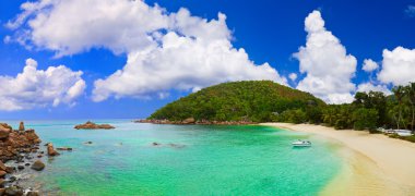 Panorama of tropical beach at Seychelles clipart