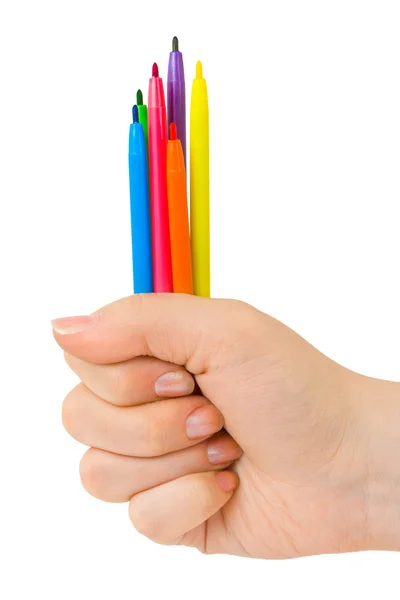 Ruka s vícebarevné pera — Stock fotografie