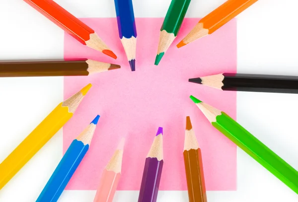 Різнокольорові олівці та папір — стокове фото
