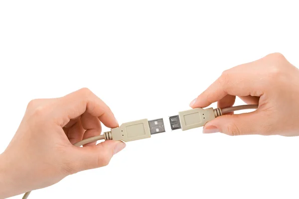 Ręce i kabel komputerowy — Zdjęcie stockowe