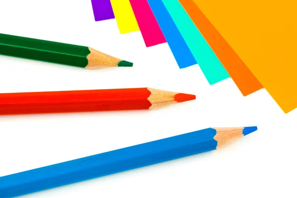 Papel multicolorido e lápis — Fotografia de Stock