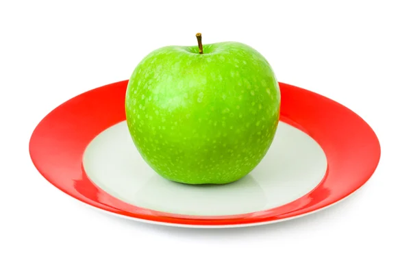 Apfel auf Teller — Stockfoto