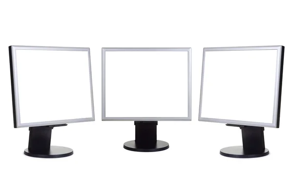 Three Modern Computer Monitors Mockup With White Blank Screen Stock