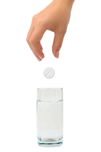 Mano, píldora y vaso de agua —  Fotos de Stock